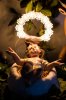 baby-jesus-manger-crown-lights-83805873.jpg